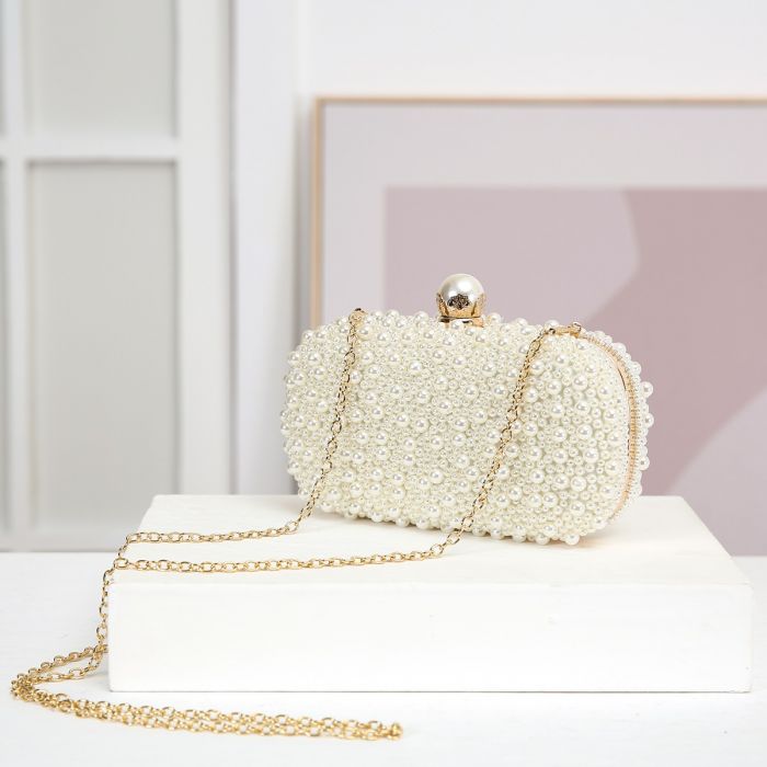 IVORY PEARL OVAL CLUTCH BAG