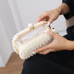 IVORY PEARL OVAL CLUTCH BAG