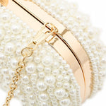 IVORY PEARL OVAL CLUTCH BAG