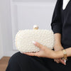 IVORY PEARL OVAL CLUTCH BAG